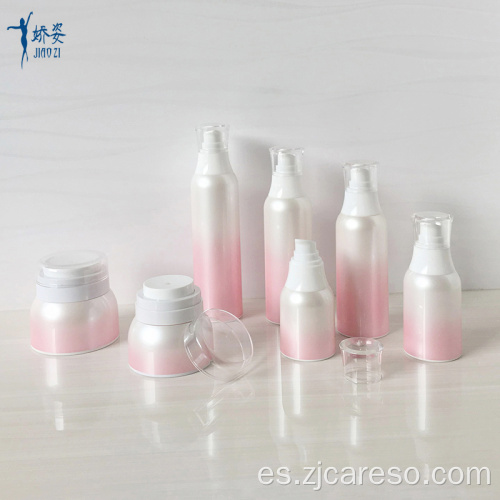 Frascos y botellas sin aire de color rosa para uso cosmético